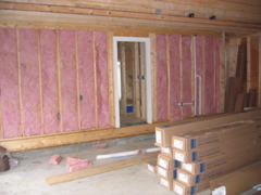 Insulation is partially in (garage)