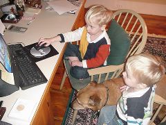 Grant teaches Cole the computer while Dixie listens in