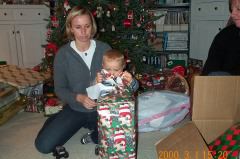 Jen and Cole open a present (NW)